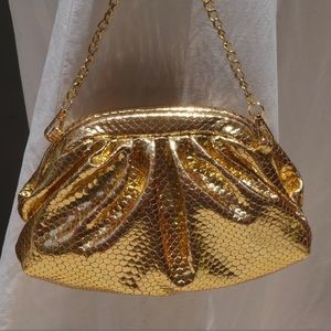 Handmade genuine leather mini dumpling clutch in gold snake pattern